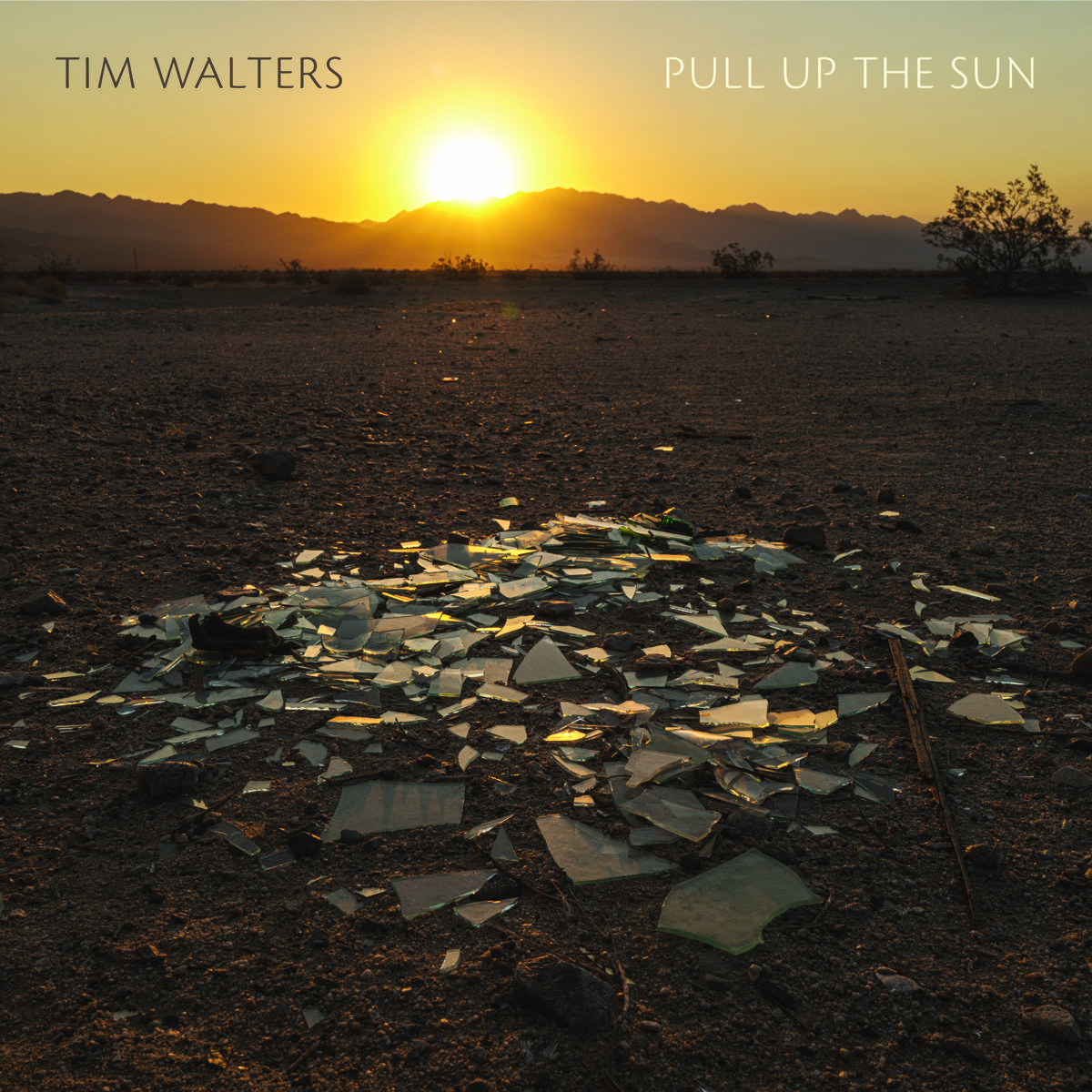 Cover of Pull Up the Sun showing shattered glass in desert landscape at sunrise.